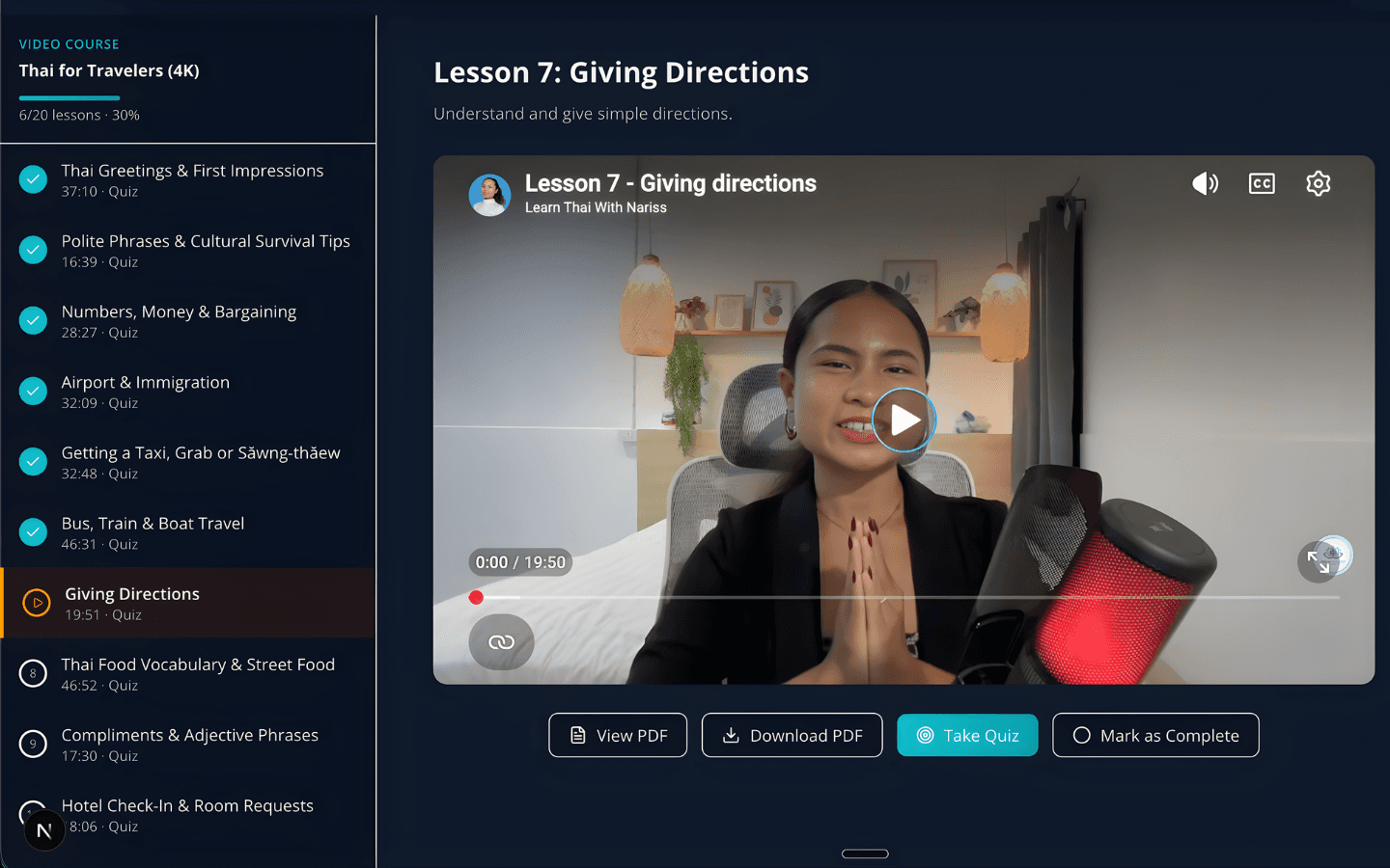 Thai with Nariss learning dashboard showing lesson sidebar, video player, and progress tracking