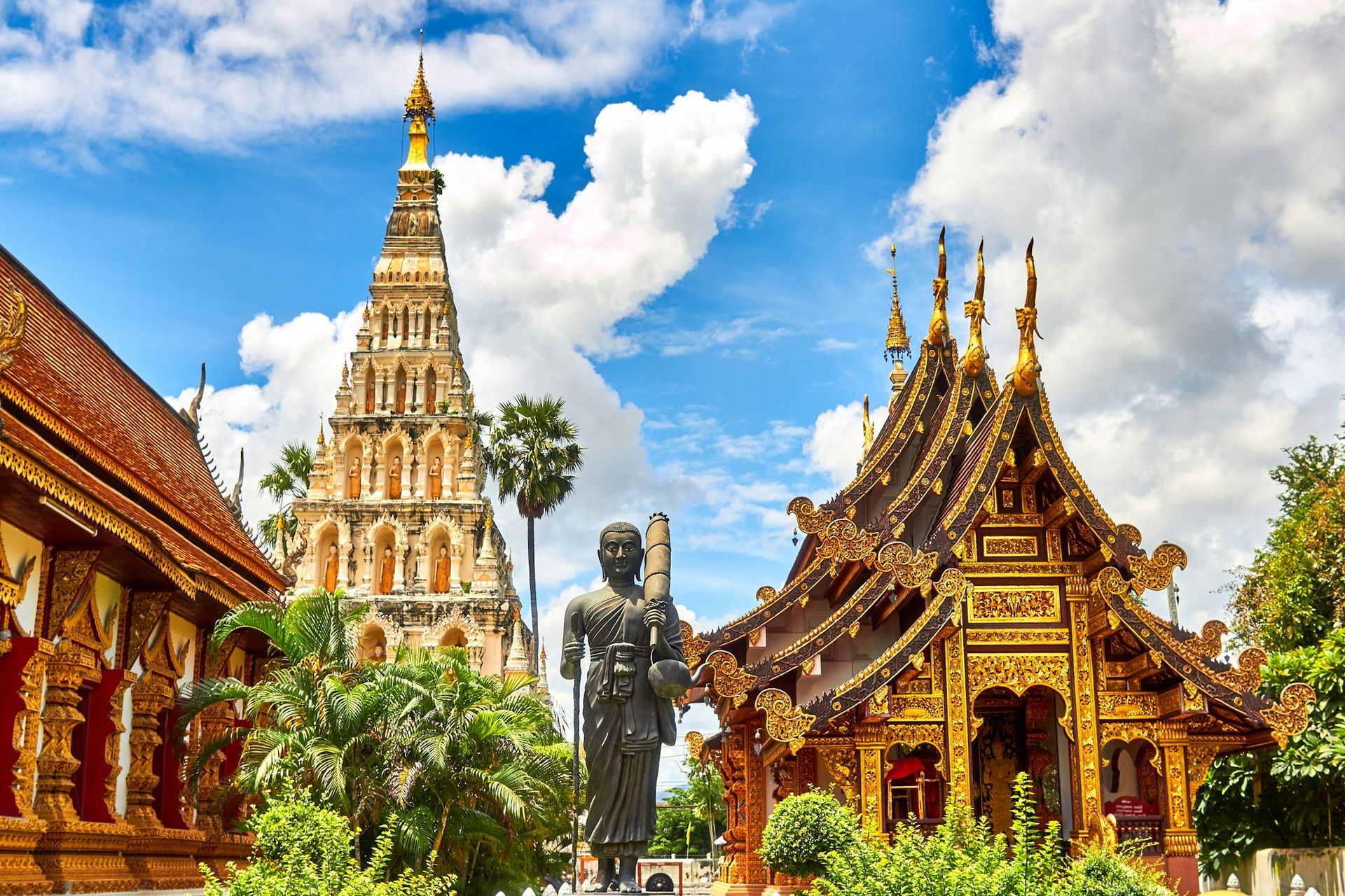 Landscape in thailand with temples and statue